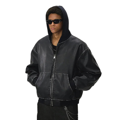 Person wearing a black leather jacket.